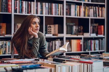 Woman buying books at a bookstore