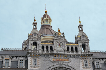 Fototapeta na wymiar Close in shot of the turrets and towers of the train station in Antwerp, Belgium.