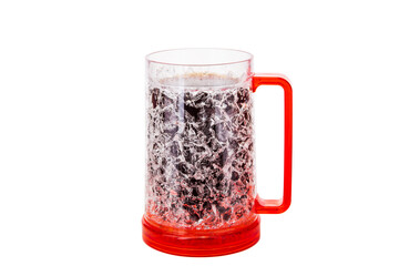 Full orange beer mug with coke with ergonomic handle isolated on white background with copy space