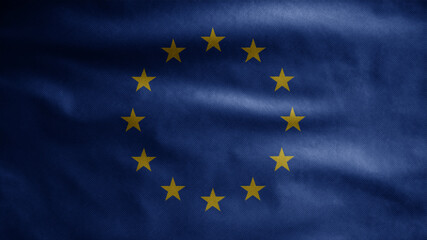 European Union flag waving on wind. Close up of Europe banner blowing soft silk.