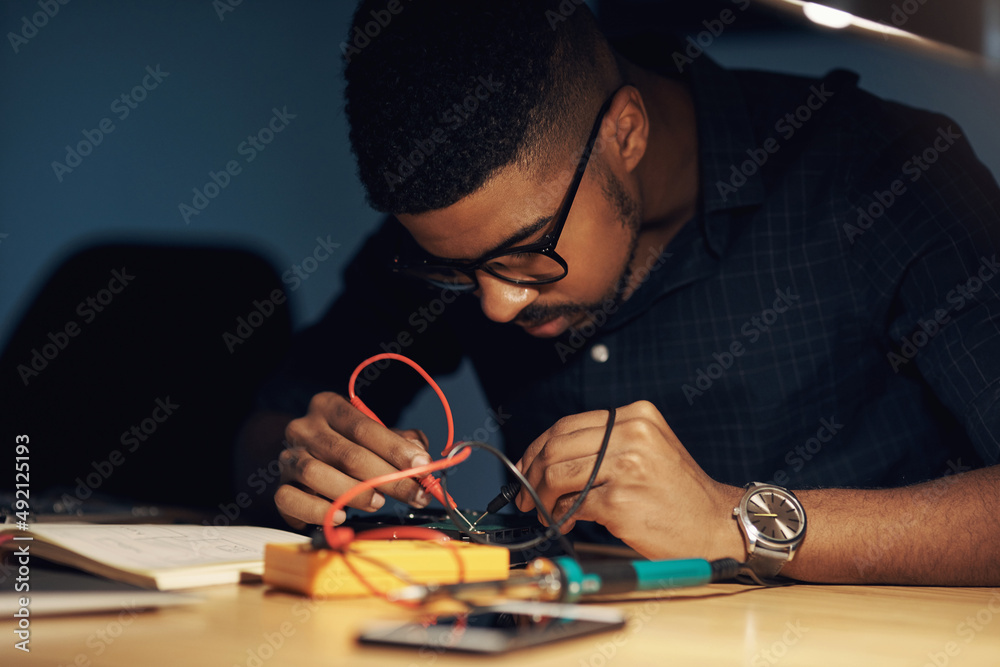 Aufkleber the expert to tackle any tech challenge. shot of a young technician repairing computer hardware.