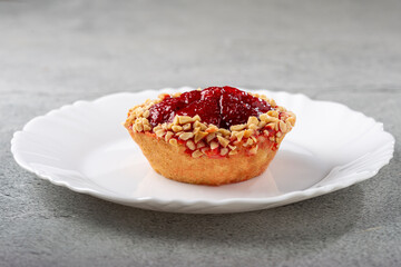 Delicious strawberry tartlet on the table.