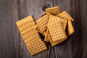 Plate with cornstarch biscuit on the table.
