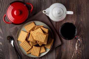 Plate with cornstarch biscuit on the table.