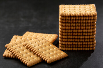 Plate with cornstarch biscuit on the table.