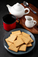 Plate with cornstarch biscuit on the table.