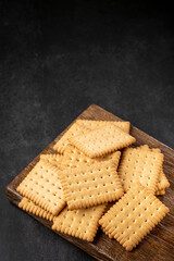 Plate with cornstarch biscuit on the table.