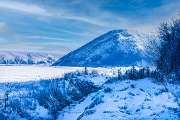 winter landscape with ancient mound