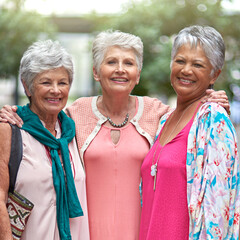 This mall has it all. Cropped portrait of a three senior women out on a shopping spree.