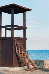 Wood lifeguard cabin on the beach. Sea, sun, sand and holiday concept.