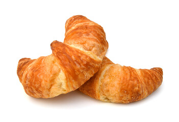 Fresh and tasty croissant over white background 