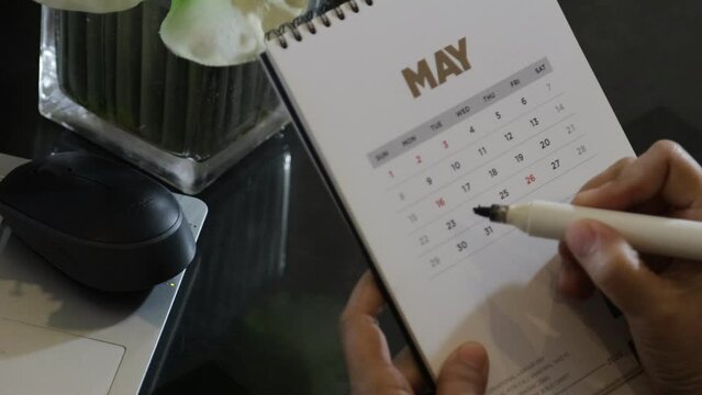 Marked and written holiday in a calendar to remind you an important appointment.
