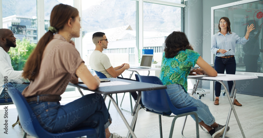 Poster Trading in wasted time. Shot of students in classroom having a discussion with the professor at university.