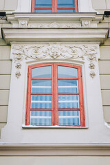 Antique window with glass and red wooden frame. Bottom view.
