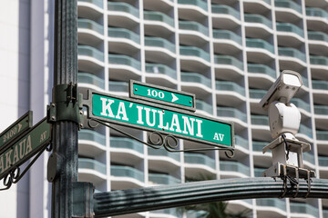 Kalakaua Avenue Road Sign in Waikiki, Hawaii, USA. Selective focus.