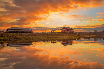 beautiful sunset painted the sky over the lake with bright colors