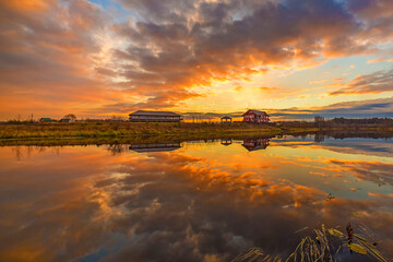 beautiful sunset painted the sky over the lake with bright colors