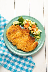 Crispy chicken fillets with salad. Healthy food
