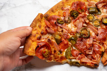 Mexican style pizza with jalapeno pepper and bacon
