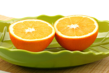 Whole orange fruit and  segments or cantles isolated on white background cutout