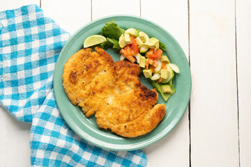 Crispy chicken fillets with salad. Healthy food