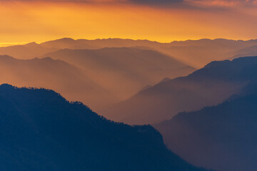 Fototapeta na wymiar The sunrise with a mountain landscape on Thailand 