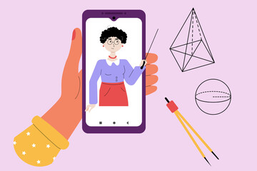 Student smotrit lesson matematiki on smartfone Obucenie s pomos'u onlineservisov