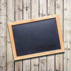 Blackboard on wood old wall