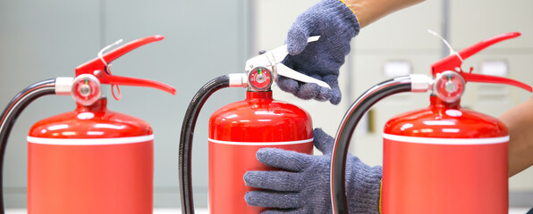 Fire extinguisher has engineer inspection checking handle prepare fire equipment for protection and...