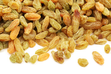 Raisins on white background