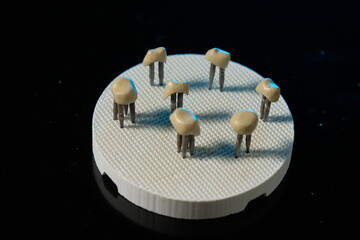 Dental ceramic bridge on isolated wite background. Metal free ceramic dental crowns