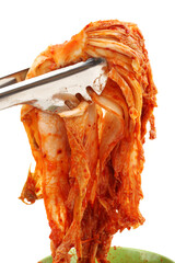 Kimchi (Korean food) close up on white background