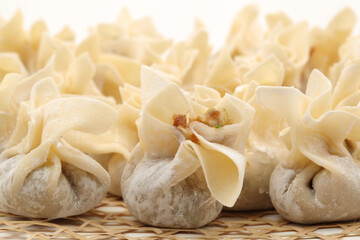 Ravioli Siu Mai on white background