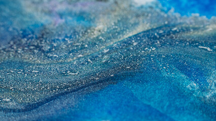 Ink background. Abstract colorful design. Creative paint mixture. White blue colors blend