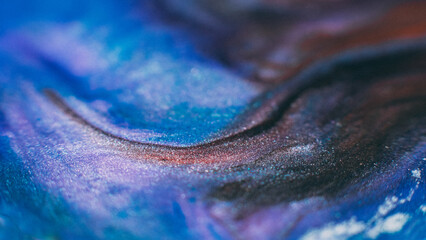 Ink background. Abstract colorful design. Creative paint mixture. Blue lavender black blue colors...