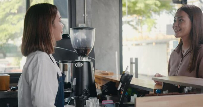 QR code payment, customer woman using digital smartphone application scanning QR code payment without money for buying coffee in cafe coffee shop, small business accepts digital payment