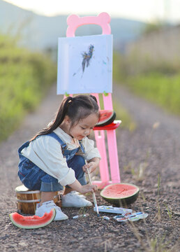 Artist girl and her watermelon.