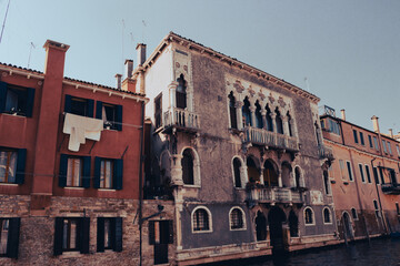 Fototapeta premium Old Venetian palaces along a small canal.