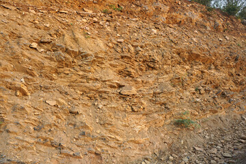 Unique orange geological shale clastic sedimentary rock formations of the Permian-Triassic period were found in the eastern part of Rong Kwang District, Phrae Province, Thailand.