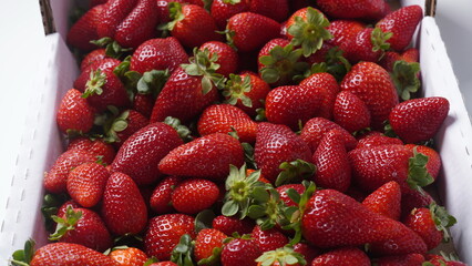 Fresh strawberries in a white box. Healthy food