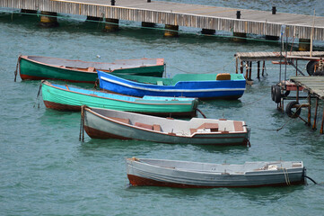 Fototapeta na wymiar Old wooden docks with boats