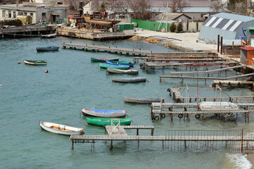Fototapeta na wymiar Old wooden docks with boats