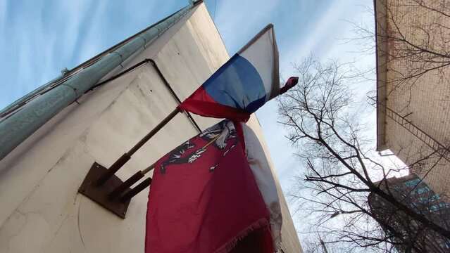 Dirty and torn flag of Russian Federation. concept of lack of freedom. Despair symbol of Russia with ragged edges. Theme of emigration and immigration against politics and war. High quality 4k footage