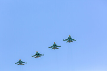 aviation group of the russian air force in flight. supersonic jetfighters on a military mission.
