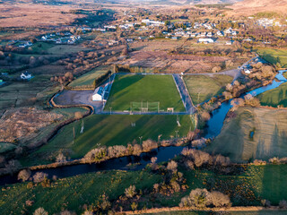Aerial view of Glenties gaelic football pitch in County Donegal, Ireland - obrazy, fototapety, plakaty