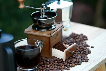 Manual coffee grinder with coffee bean and Drip Kettle Set with Coffee beans