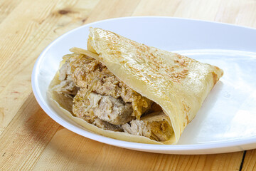 Pancake with chicken and onion