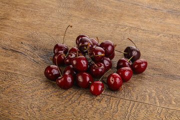 Ripe sweet cherry berries heap