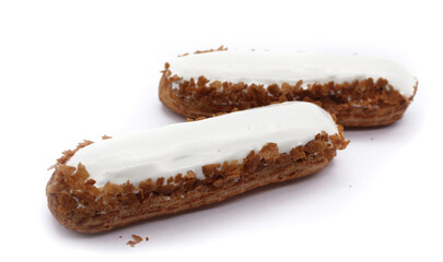 Eclair with decorative sugar glaze, French dessert
