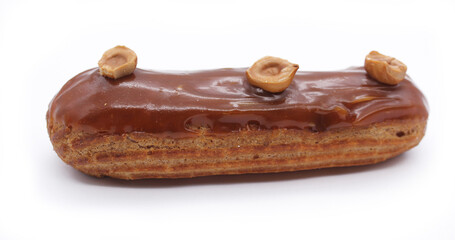 Eclair with decorative sugar glaze, French dessert